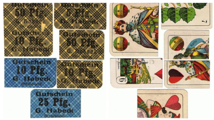 A collection of playing cards featuring various designs and point values.