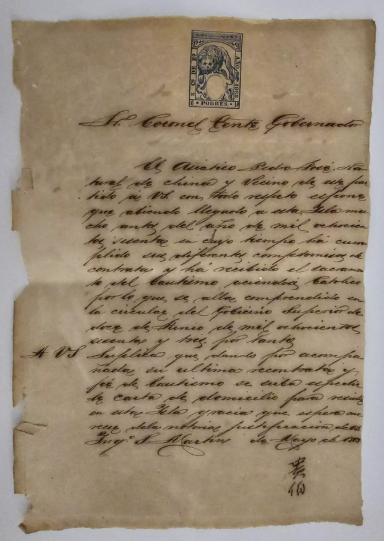 Handwritten letter on aged paper with a decorative stamp at the top.