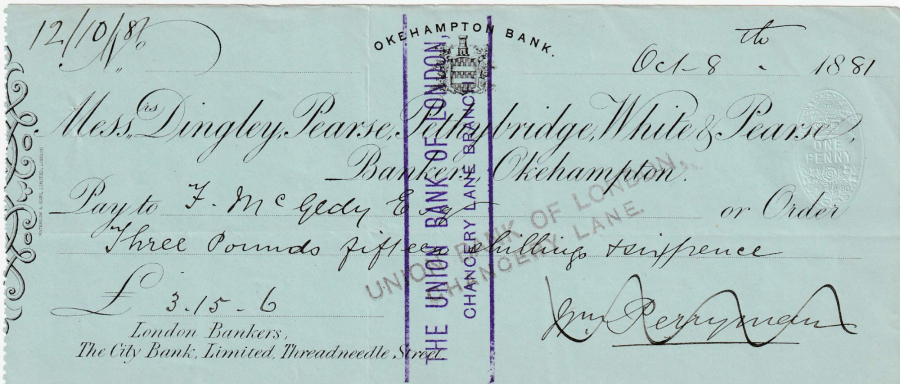 A dated cheque addressed to Miss Dorothy Evans, signed by a bank official.