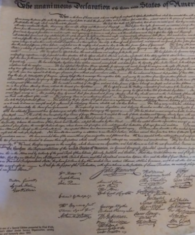 Document with handwritten text and signatures, possibly a historical or legal manuscript.